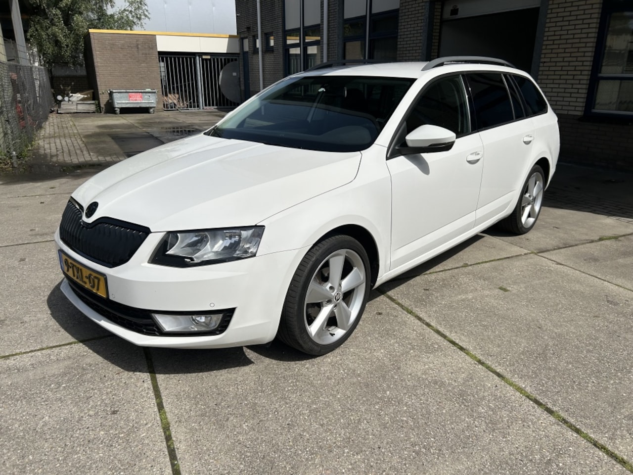 Skoda Octavia Combi - 1.2 TSI Grt Amb Bns NAVI - AutoWereld.nl