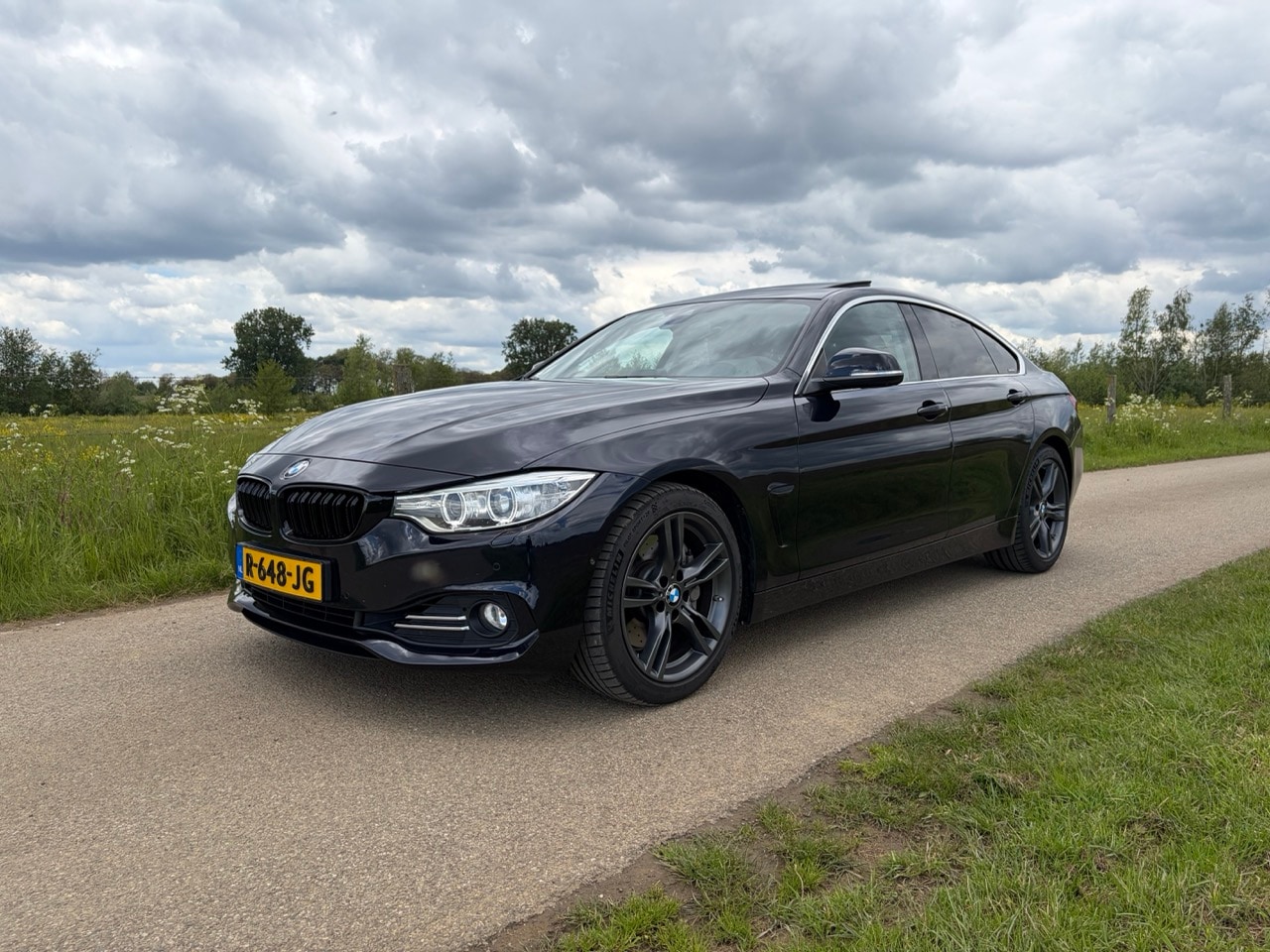 BMW 4-serie Gran Coupé - 435i High Executive BMW 4-Serie 435i Gran Coupe 2014 Luxury line|HUD|M-onderstel - AutoWereld.nl
