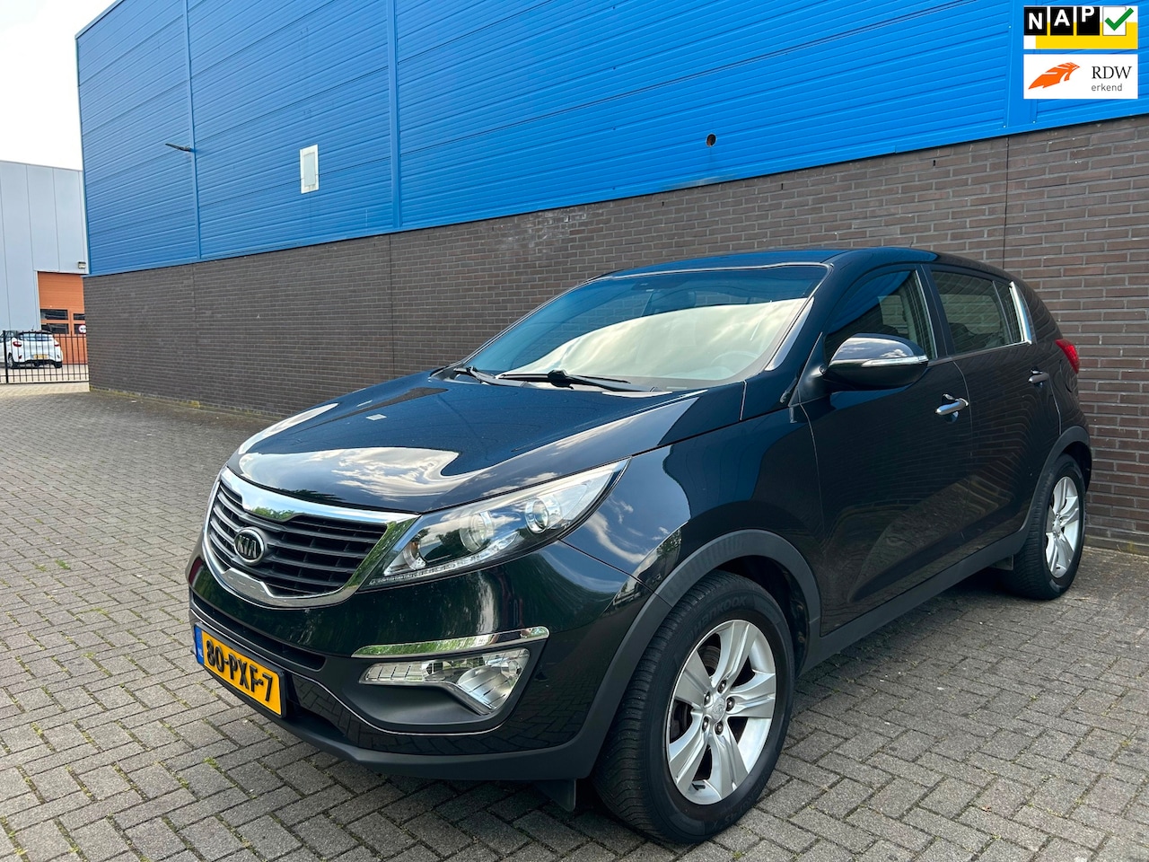 Kia Sportage - 1.6 GDI X-ecutive | Trekhaak | Parkeersensoren | Cruise | Climate | Inklapbare & Verwarmde - AutoWereld.nl