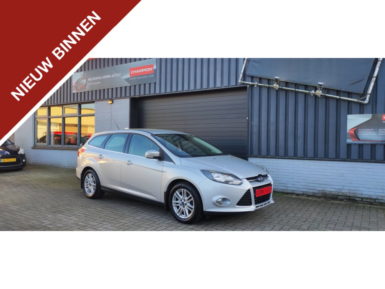 Ford Focus Wagon - 1.0 EcoB. Titanium - AutoWereld.nl