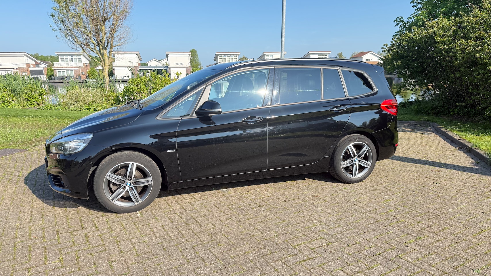 BMW 2-serie Gran Tourer - 218i 7p. High Executive LEER - AutoWereld.nl