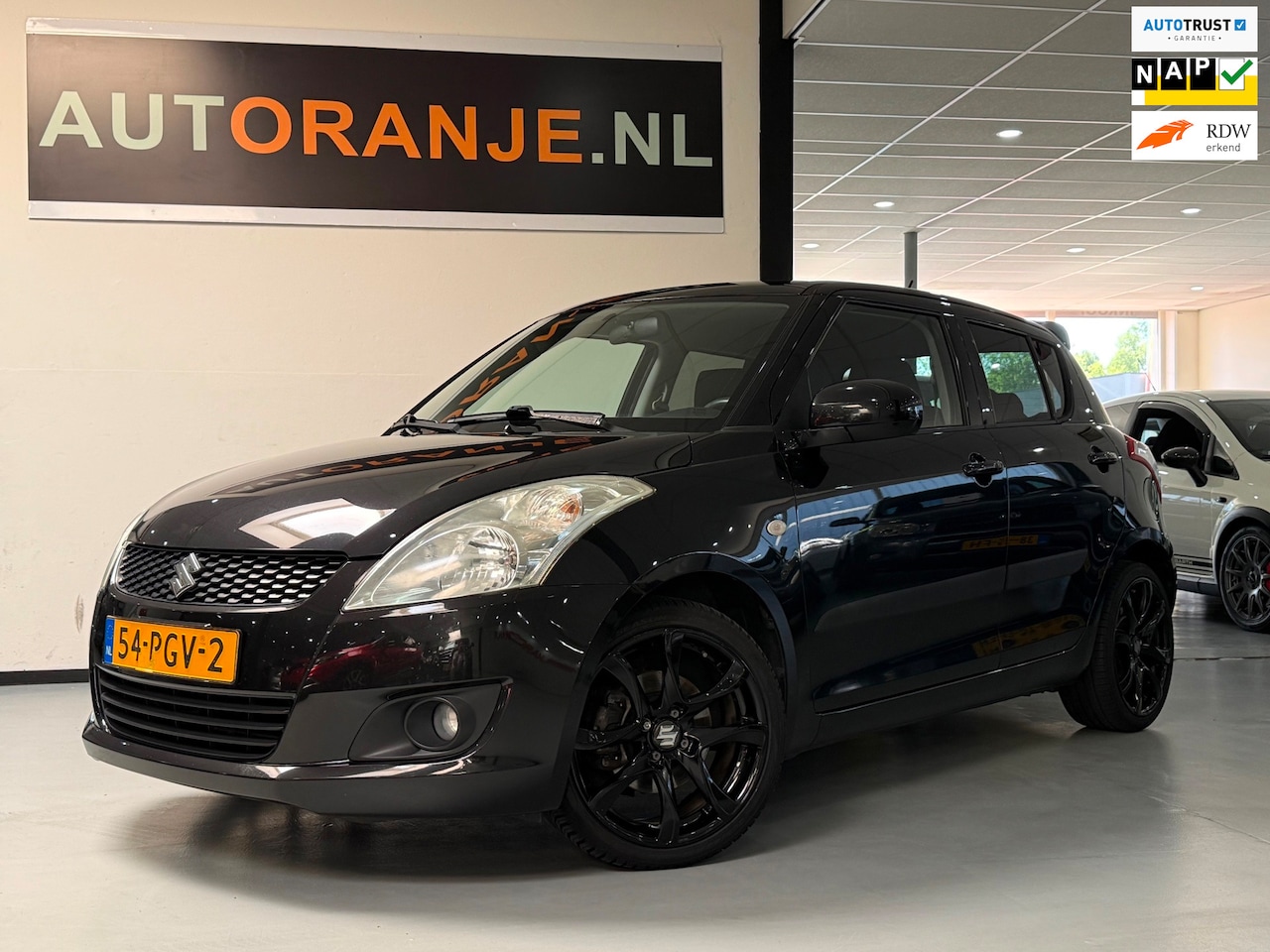 Suzuki Swift - 1.2 Exclusive EASSS-Clima-Cruise-Navi-NAP!! - AutoWereld.nl
