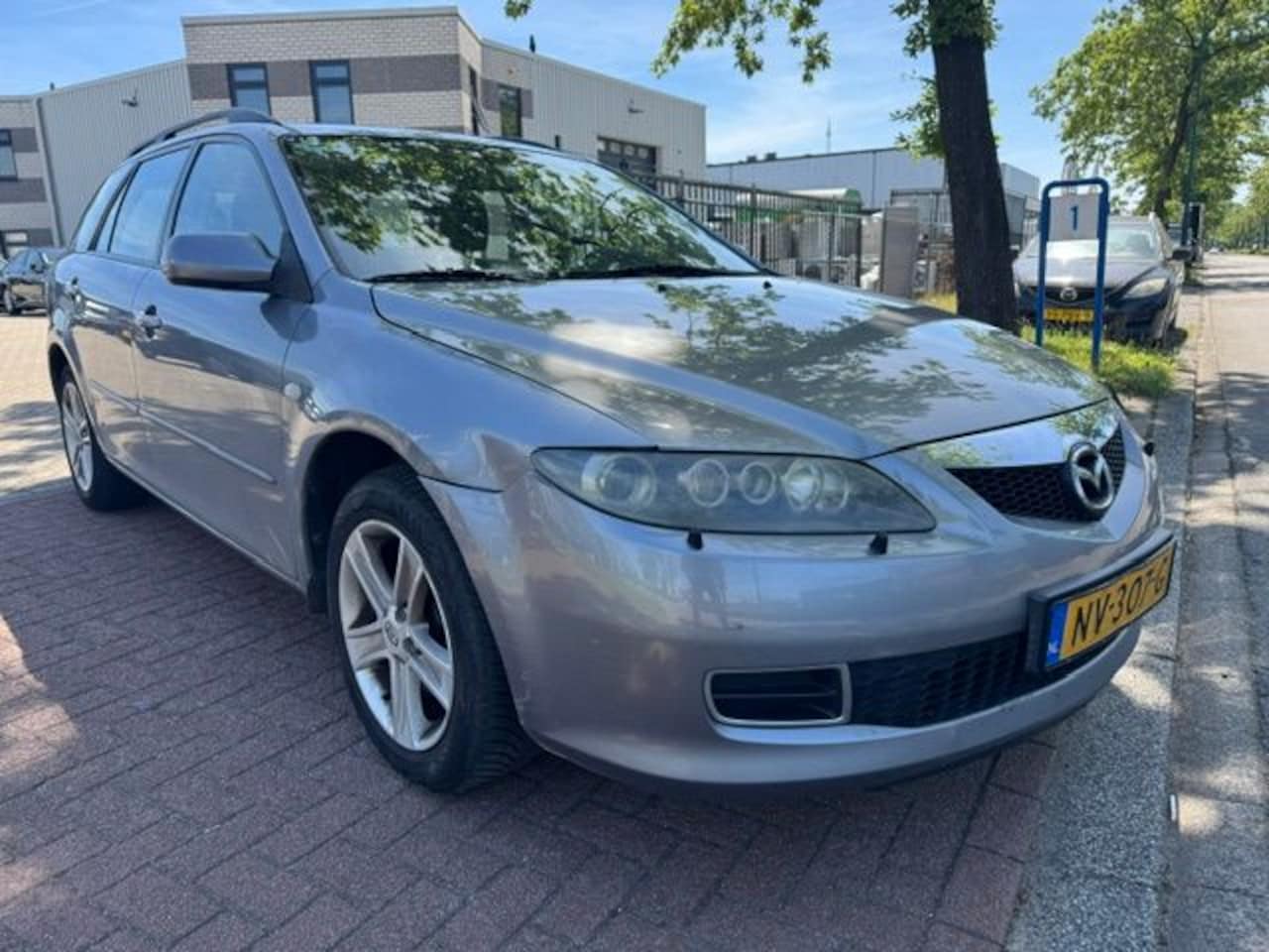 Mazda 6 Sportbreak - 1.8i Exclusive Airco/ECC - AutoWereld.nl