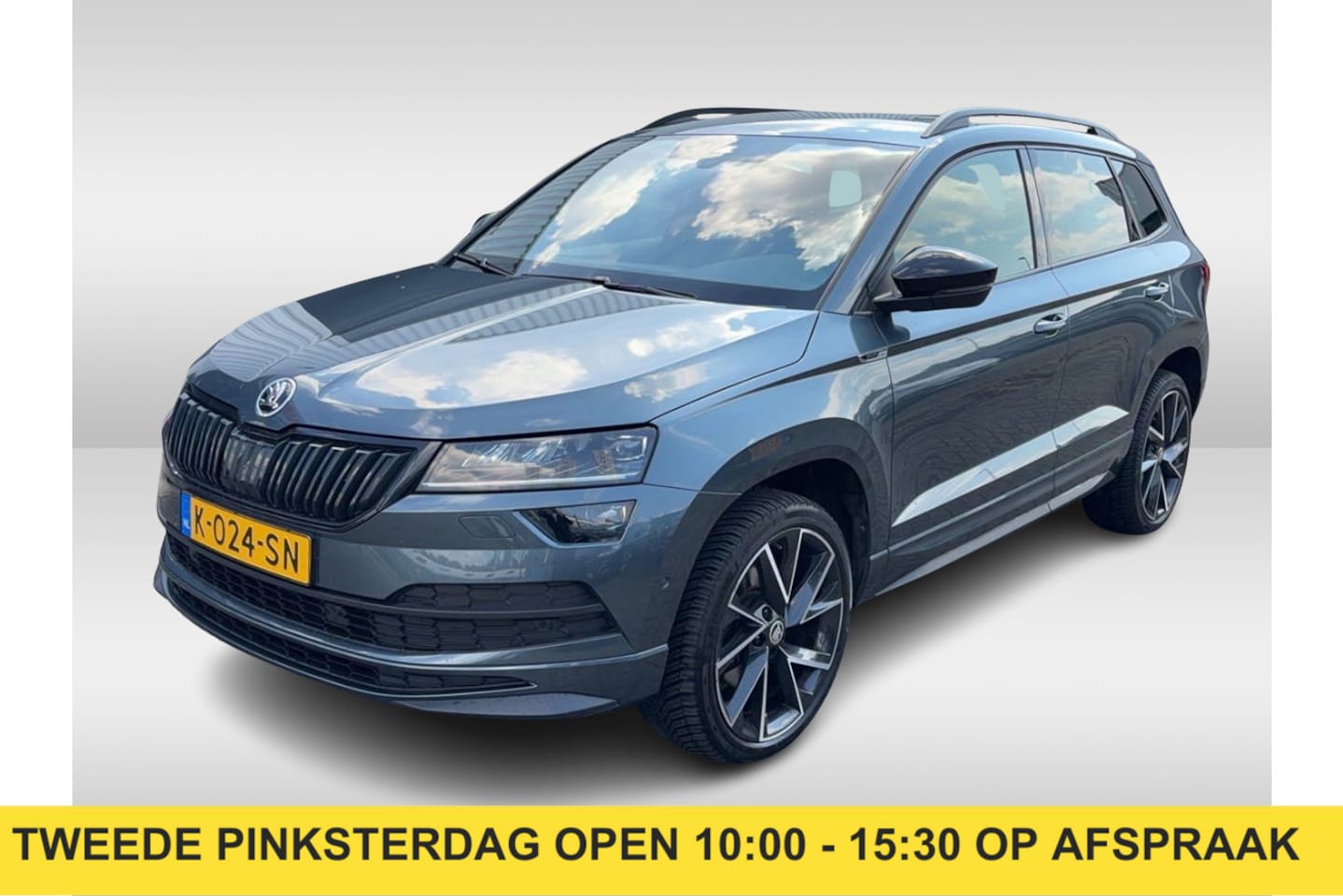 Skoda Karoq - 1.5 TSI ACT Sportline Business / Camera / CarPlay / Keyless / 19'' / Stoel+Stuurverwarming - AutoWereld.nl