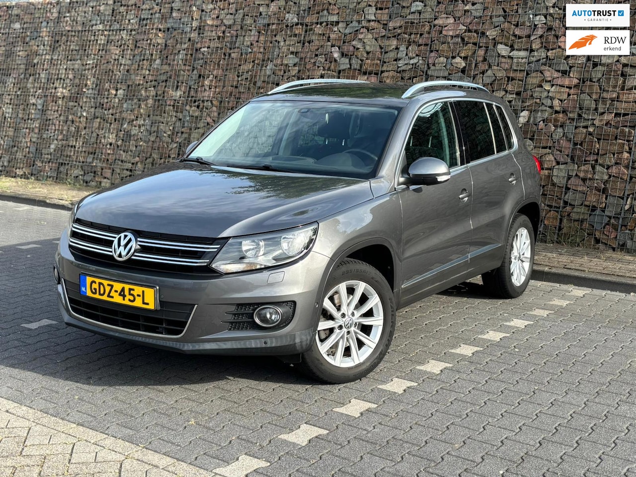 Volkswagen Tiguan - 1.4 TSI Sport&Style|Clima|Cruise|Pdc|Stoelvw|Apk - AutoWereld.nl