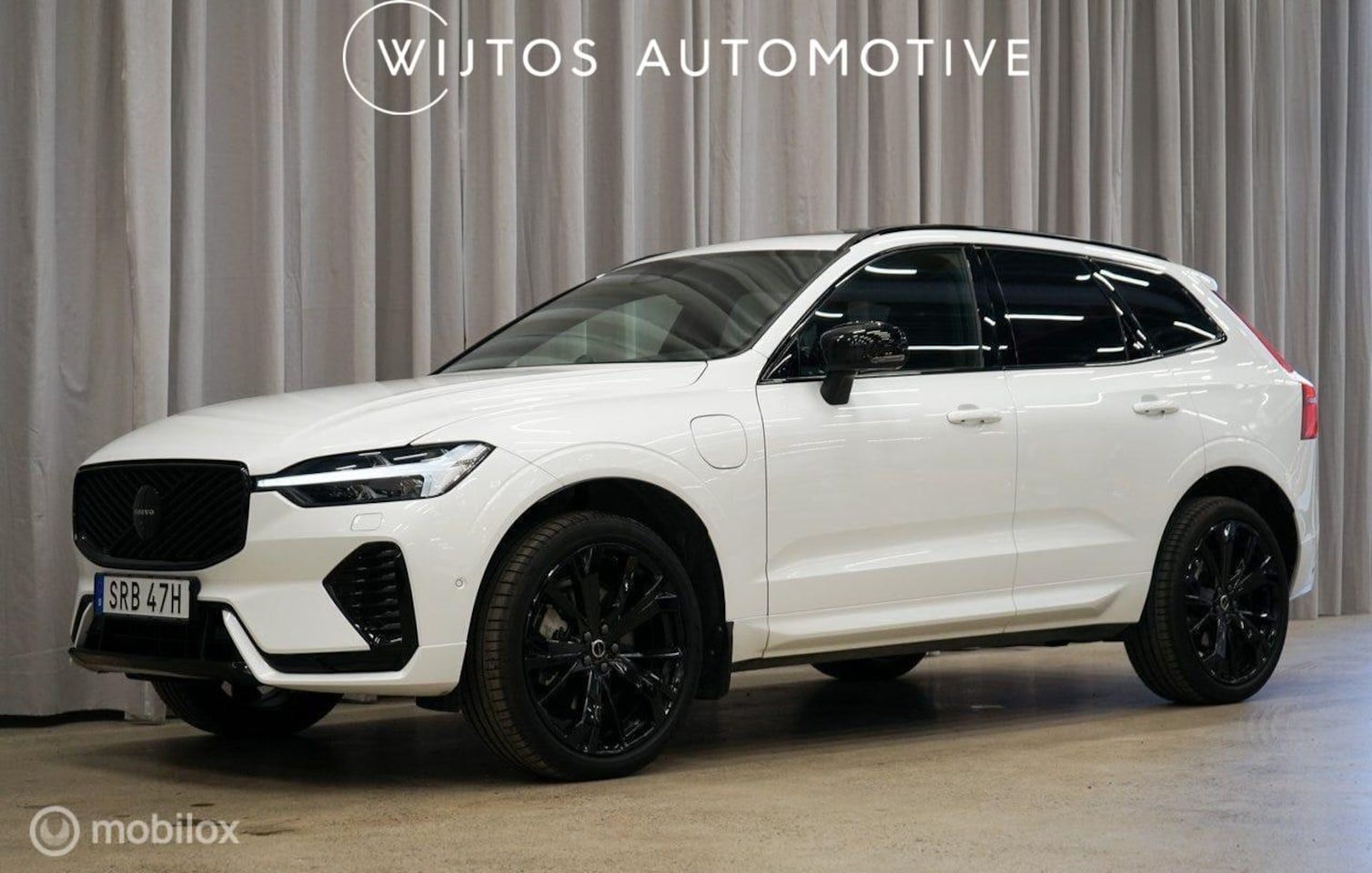 Volvo XC60 - 2.0 T6 Plug-in hybrid AWD Ultra Black Edition B&W - AutoWereld.nl