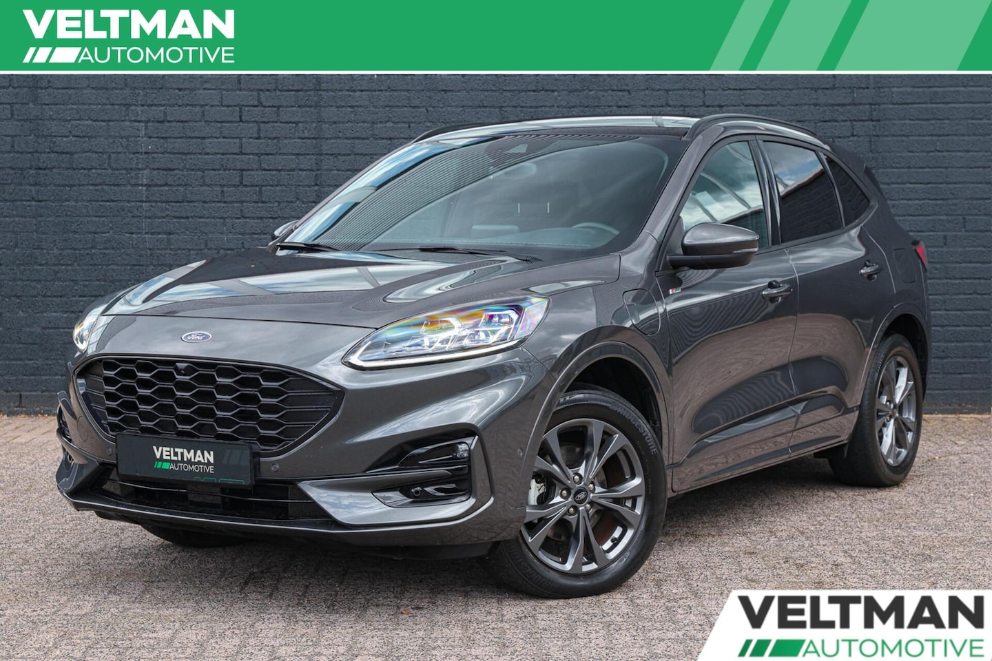 Ford Kuga - 2.5 PHEV ST-Line X PANO TREKHAAK ADAPTIVE CRUISE CAMERA STUURVERWARMING B&O - AutoWereld.nl