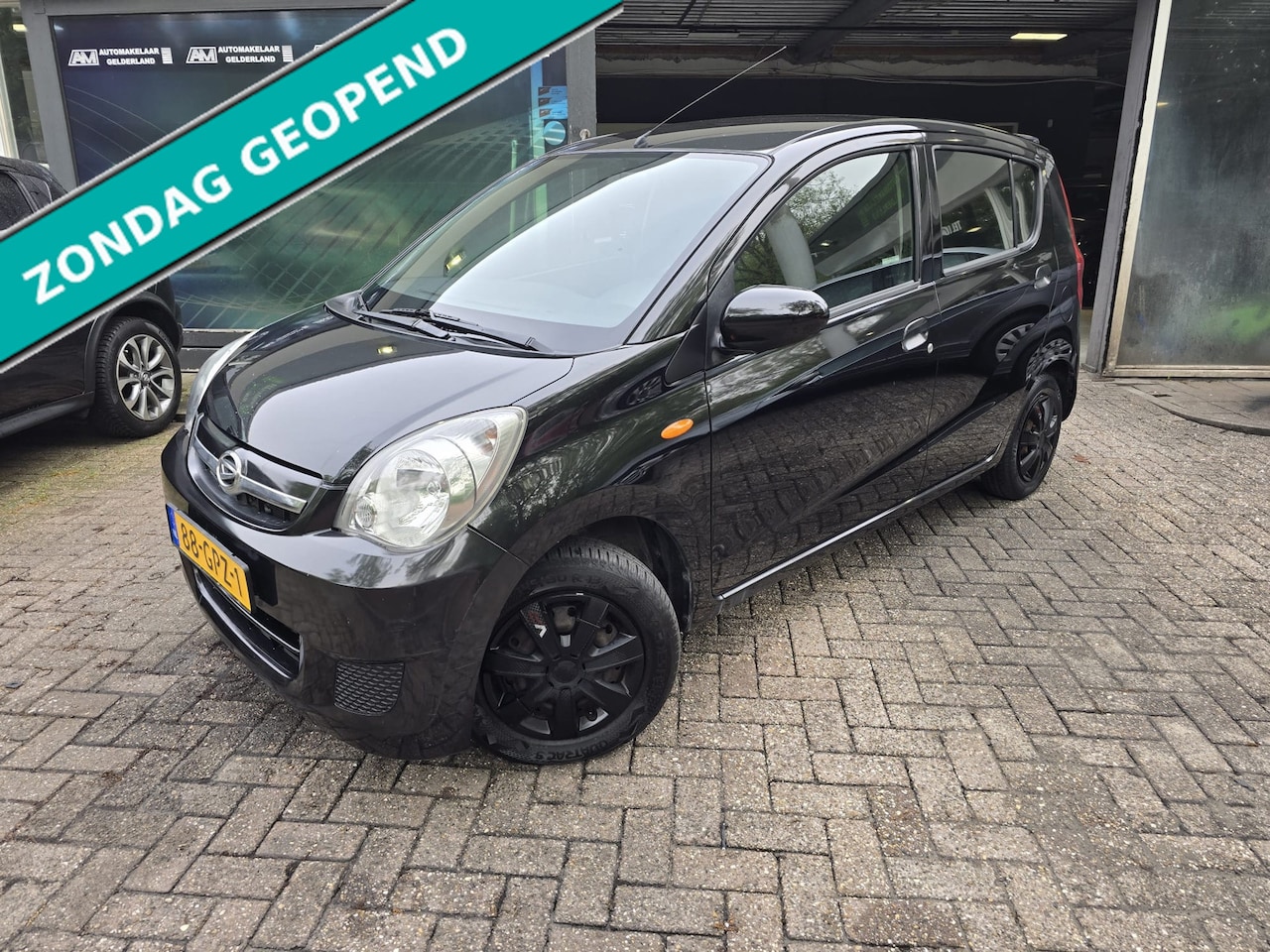 Daihatsu Cuore - 1.0 Premium | 1E EIGENAAR | 12MND GARANTIE | AIRCO | ELEC RAMEN | NW APK | - AutoWereld.nl