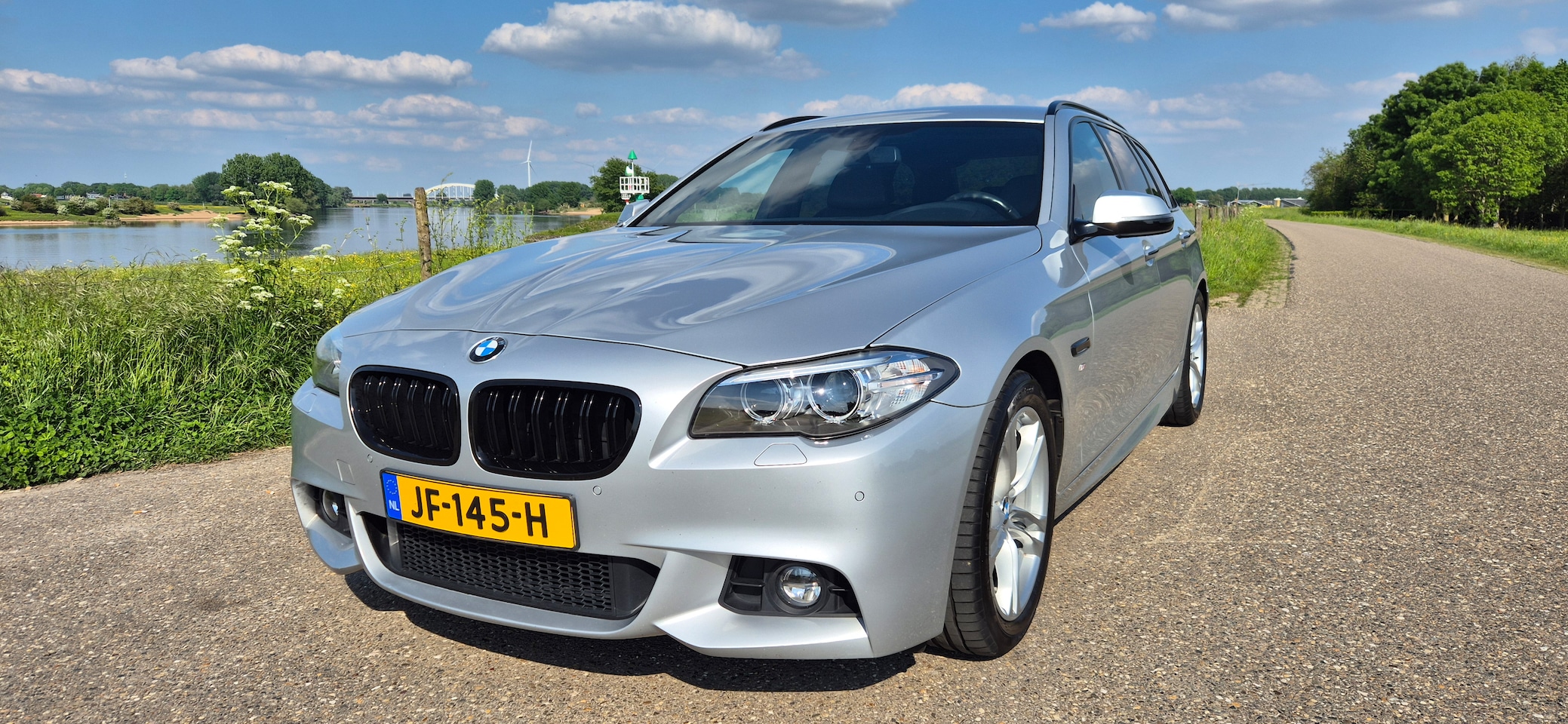 BMW 5-serie Touring - 520i M Sport High Executive Automaat 184PK M Sport Edition TOURING / Trekhaak / ALL-BLACK / F11 - AutoWereld.nl