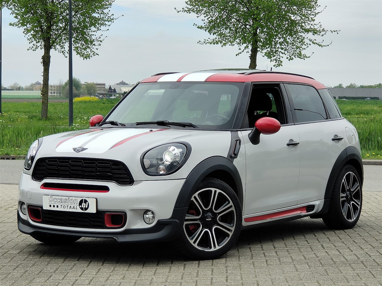 MINI Countryman - 1.6 John Cooper Works ALL4 Chili | Panorama | Navi | Leder | Stoelverwarming - AutoWereld.nl