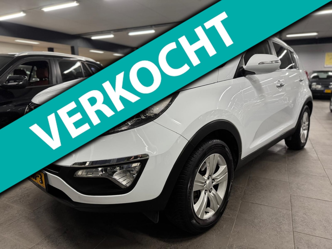 Kia Sportage - 2.0 X-ecutive Plus Pack navigatie half leer clima camera cruise controle lm-velgen elekt-p - AutoWereld.nl