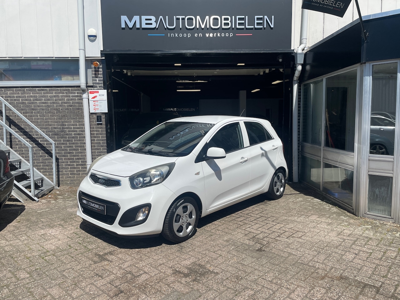 Kia Picanto - 1.2 CVVT ISG Comfort Pack/ 2e eigenaar!/Airco/5Deurs/NAP/APK/ 4 Cilinder! - AutoWereld.nl