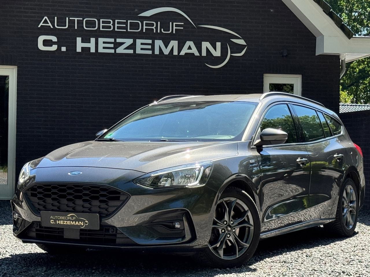 Ford Focus Wagon - 1.0 125PK ST Line Business Navigatie Cruise Control LED 1e eigenaar dealerOH - AutoWereld.nl
