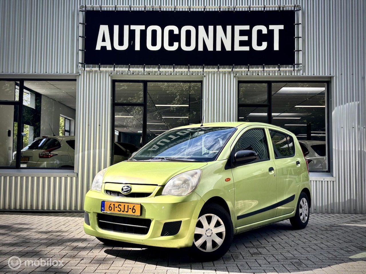 Daihatsu Cuore - 1.0 Comfort Airco 1.0 Comfort. AIRCO, CRUISE - AutoWereld.nl