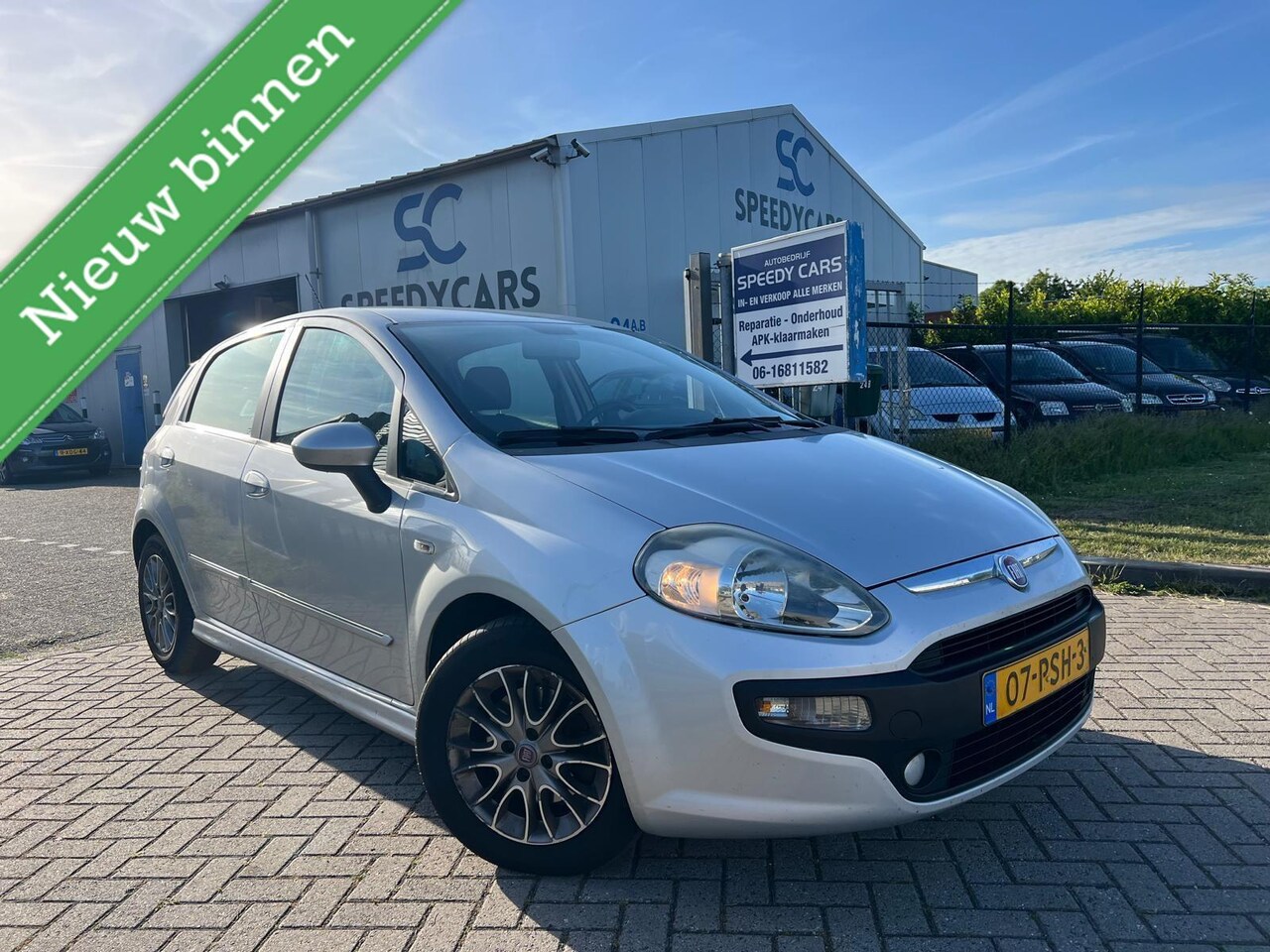 Fiat Punto Evo - 1.3 M-Jet Dynamic Airco Cruise LMV - AutoWereld.nl