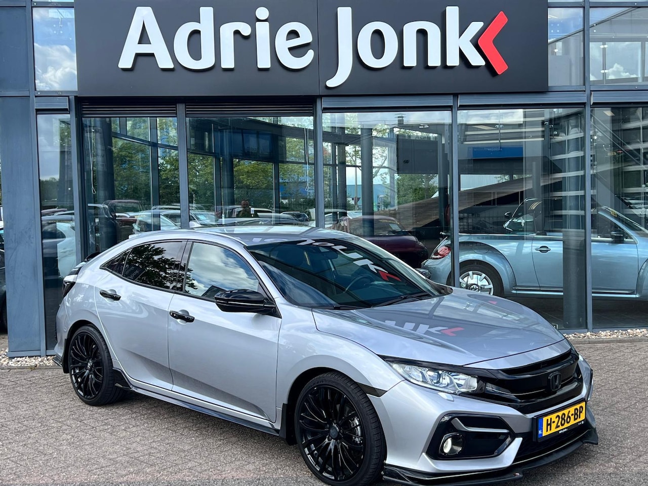 Honda Civic - 1.0 i-VTEC Elegance | ACHTERUITRIJCAMERA | NAVIGATIE | ACC | STOELVERWARING | CLIMATE CONT - AutoWereld.nl