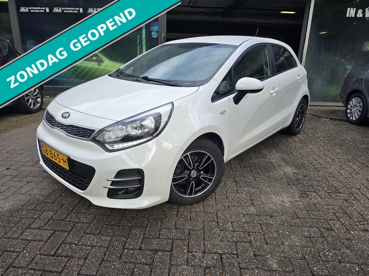 Kia Rio - 1.2 CVVT DynamicLine | 2E EIGENAAR | 12MND GARANTIE | AIRCO | CAMERA | NAVI | - AutoWereld.nl
