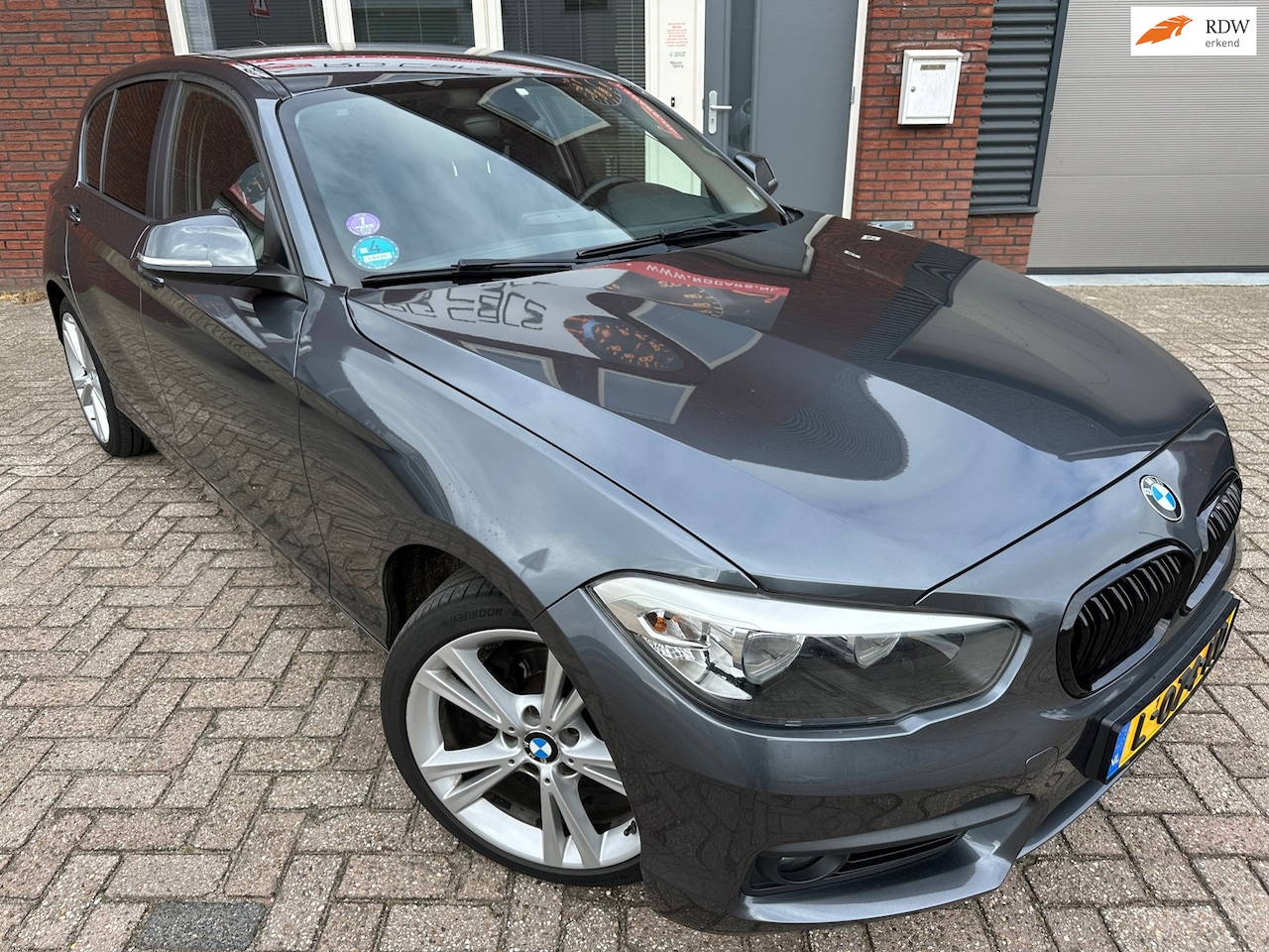 BMW 1-serie - 116i Sport / Camera / PDC / Stoelverwarming - AutoWereld.nl