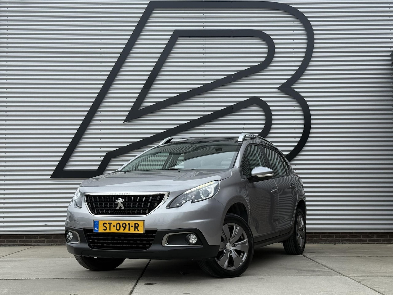 Peugeot 2008 - 1.2 PureTech Blue Lion 2e Eigenaar|Navi|Pano|Trekhaak|Airco|Cruise|PDC|Carplay|N.A.P|APK t - AutoWereld.nl