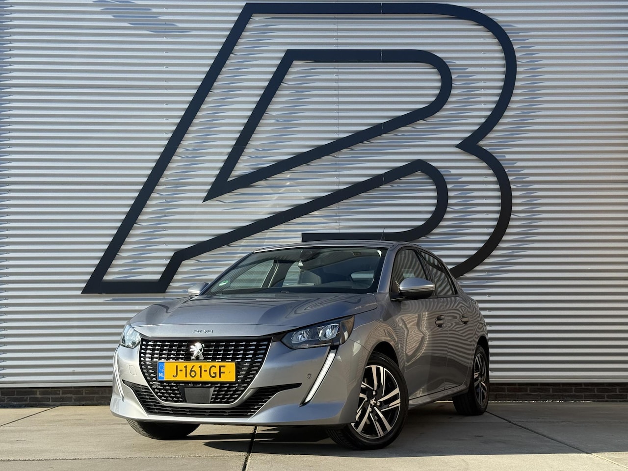 Peugeot 208 - 1.2 PureTech Allure 2e Eigenaar|Adap-cruise|Clima|Camera|Trekhaak|Carplay|PDC V+A|N.A.P|AP - AutoWereld.nl