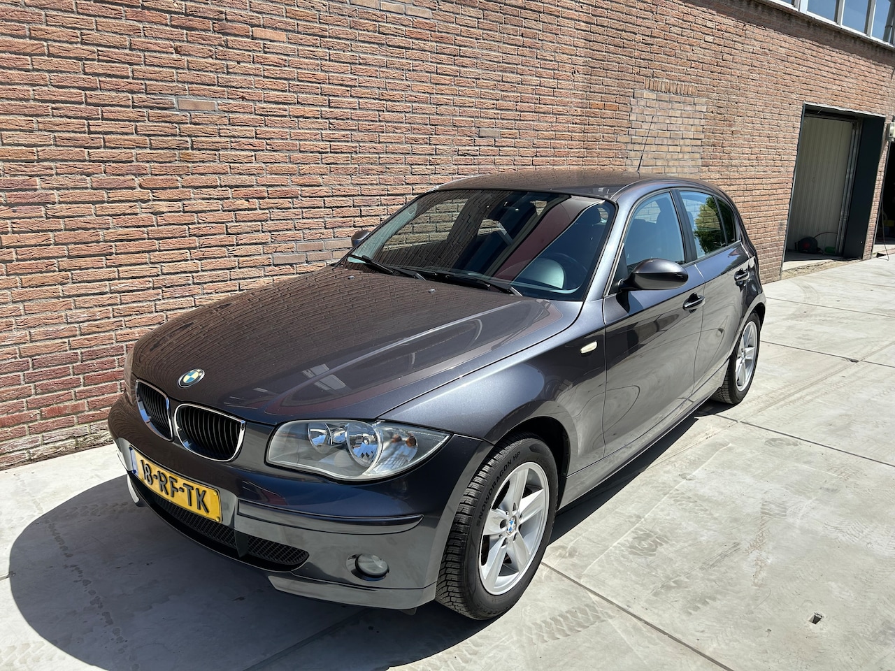 BMW 1-serie - 120i High Executive BMW 120i High Executive 5drs Leer Navi Stoelverw. Cruise - AutoWereld.nl