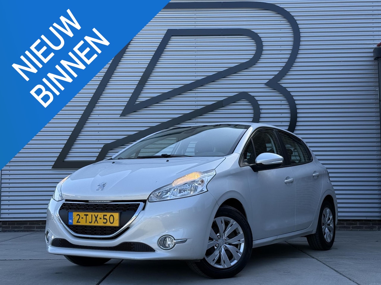 Peugeot 208 - 1.2 VTi Envy 2e Eigenaar|Navi|PDC|Clima|Cruise|N.A.P|APK tot 08-2026 - AutoWereld.nl