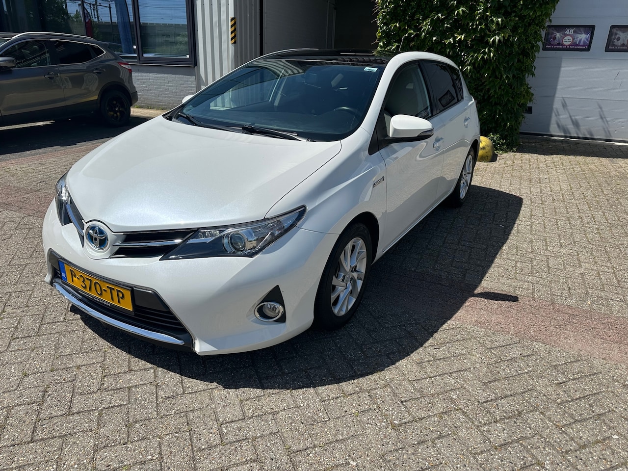 Toyota Auris - 1.8 Hybrid Aspiration 1.8 Hybrid Aspiration,PANORAMADAK, Camera - AutoWereld.nl
