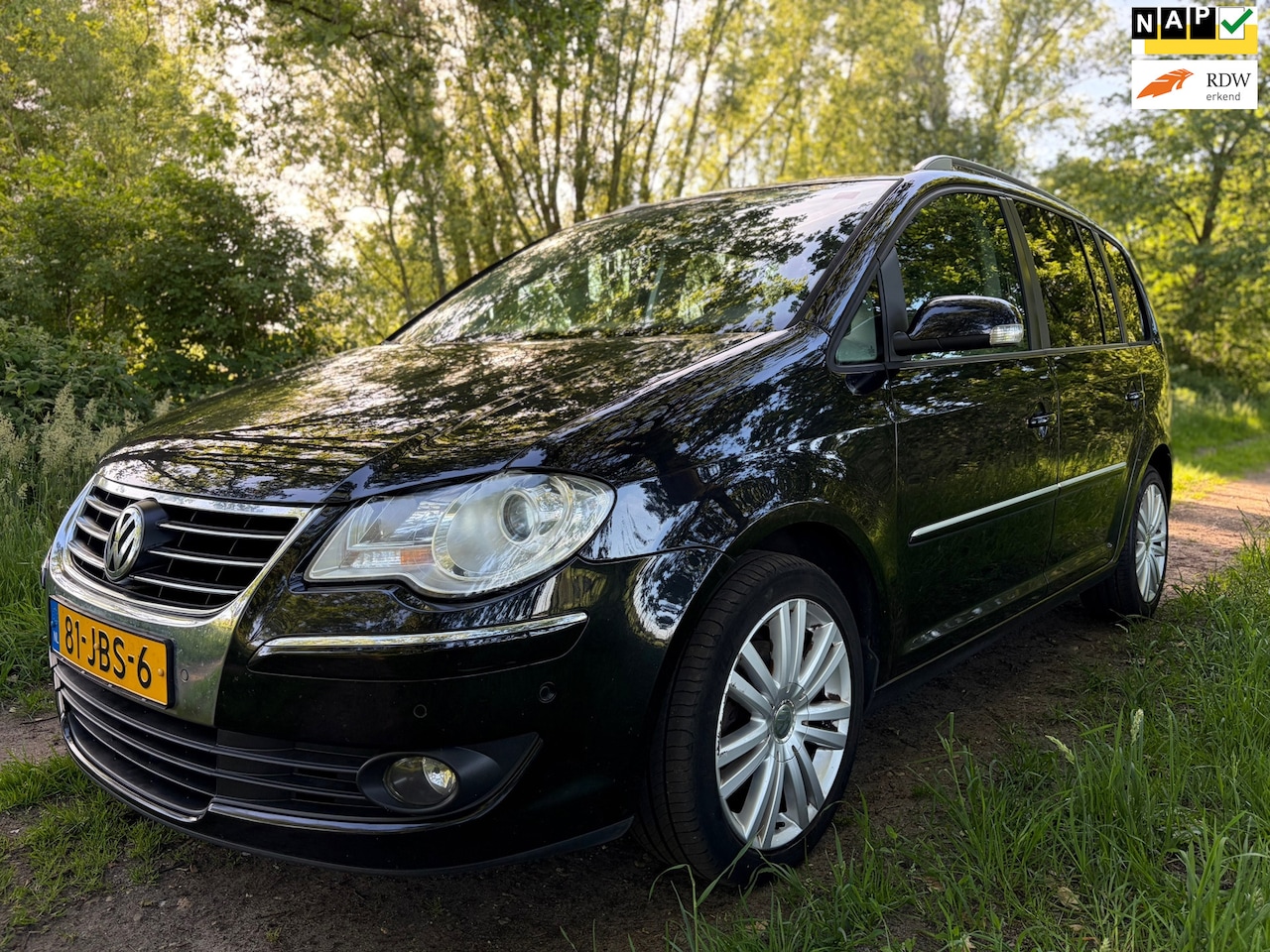 Volkswagen Touran - 1.4 TSI Highline 7P!/Navi/Cruise/P.sensoren/Clima/APK NEW! - AutoWereld.nl