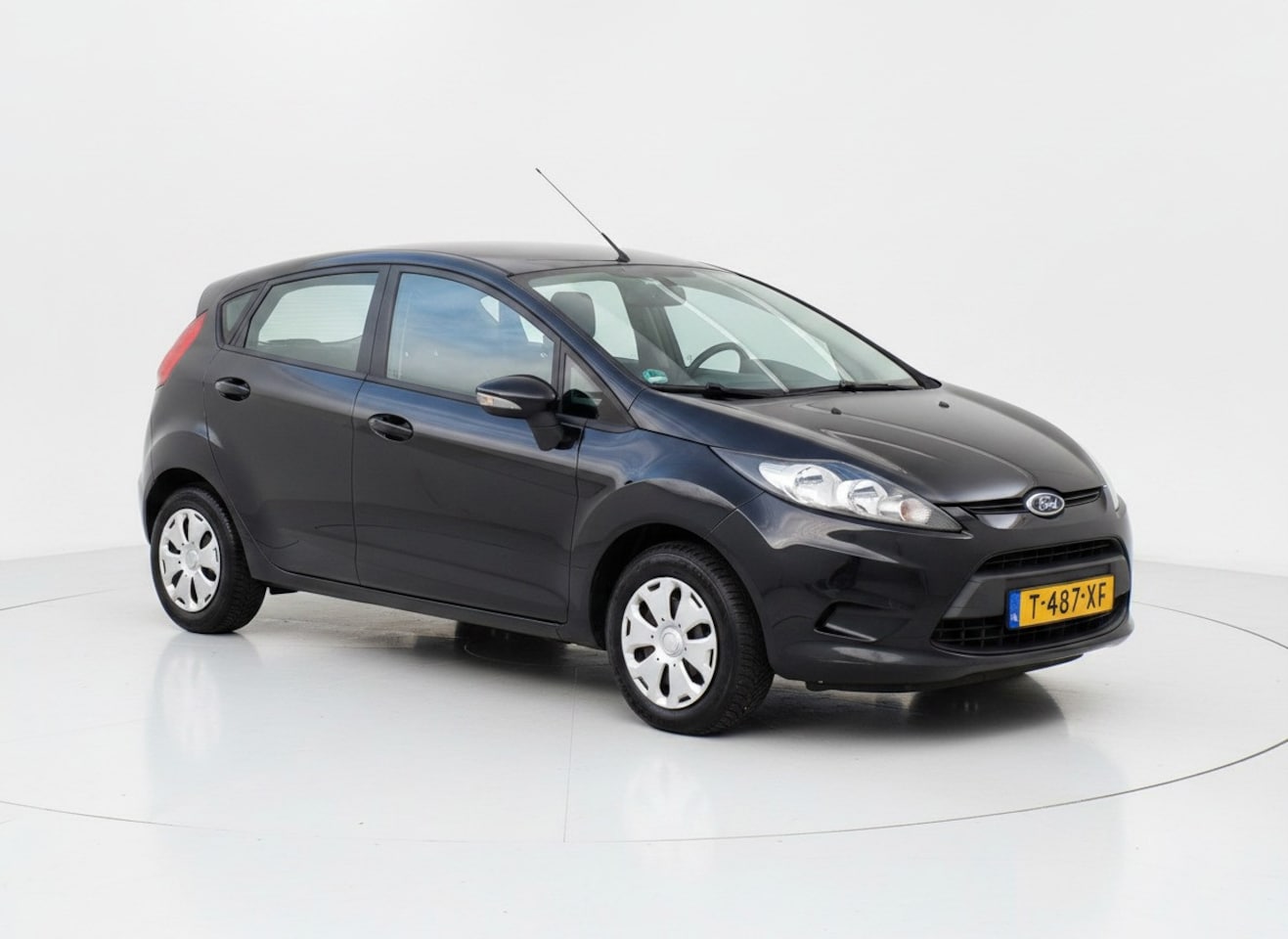 Ford Fiesta - 1.4 Ghia|Automaat|Airco|Aux|Elektrische ramen - AutoWereld.nl