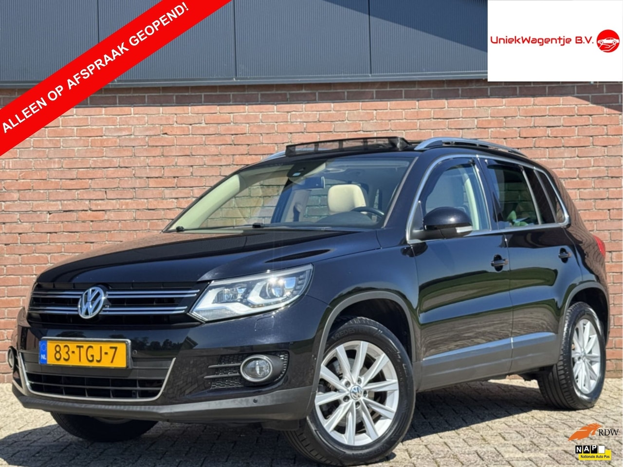 Volkswagen Tiguan - 2.0 TSI SPORT&STYLE 4MOTION | NL-AUTO! - AutoWereld.nl