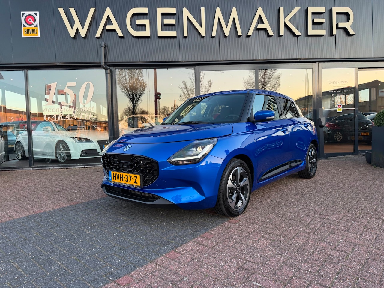 Suzuki Swift - 1.2 Style Smart Hybrid AUT|NAV|CAM|NIEUWSTAAT - AutoWereld.nl