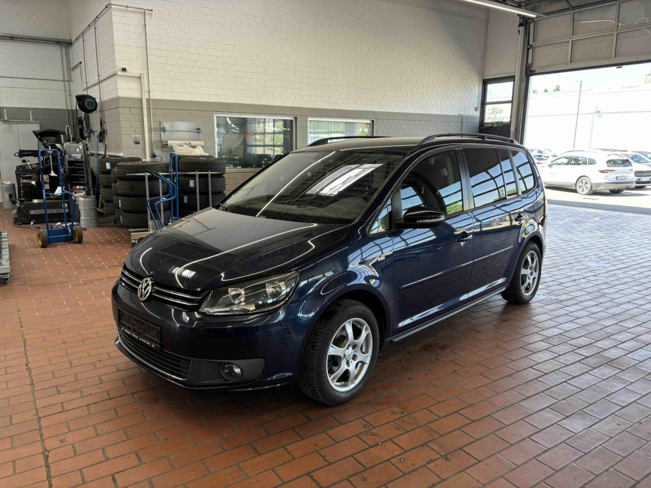 Volkswagen Touran - 1.4 TSI Comfortline 7p. Distr. ketting vervangen 'Wordt binnenkort verwacht' - AutoWereld.nl