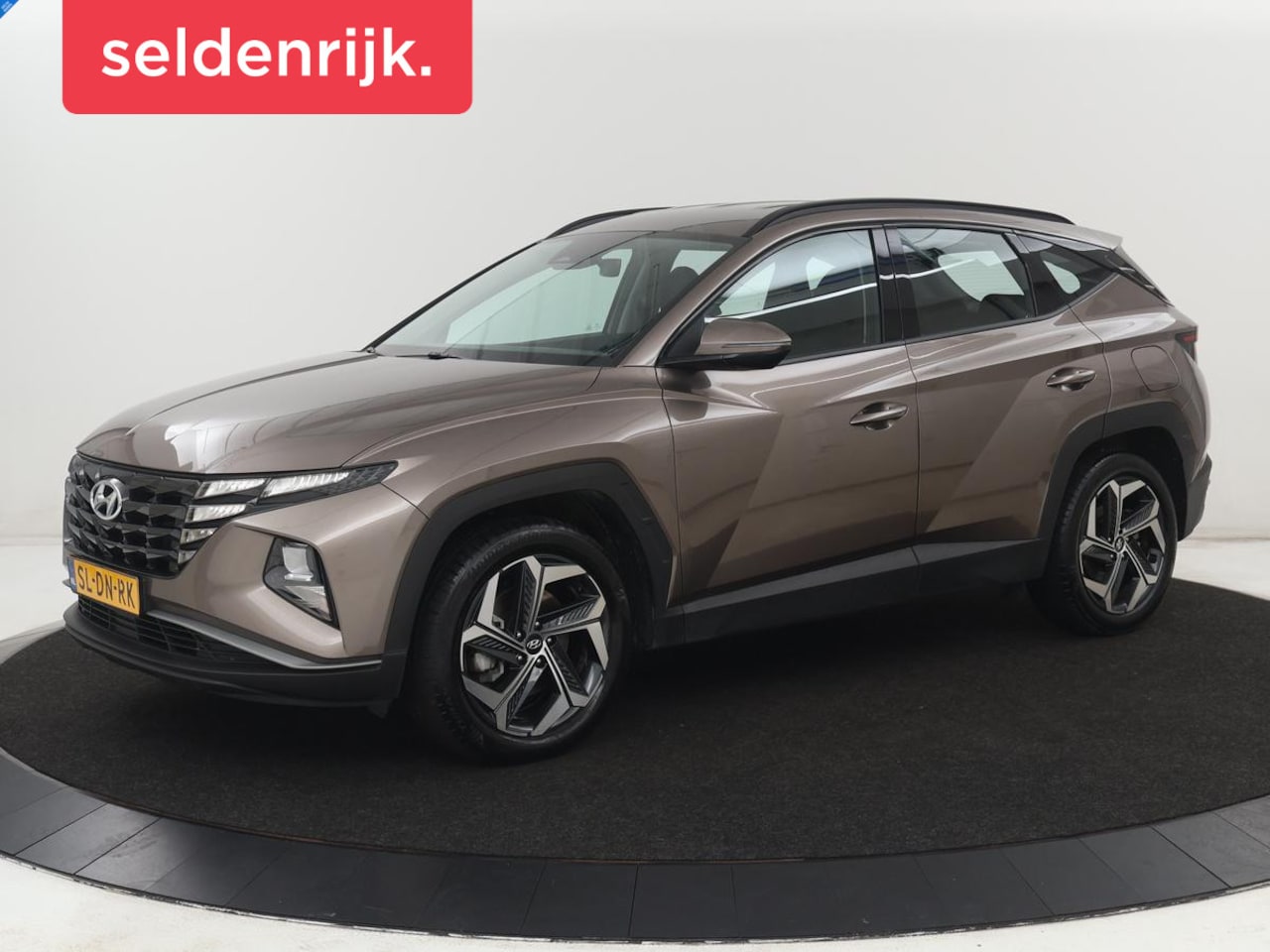Hyundai Tucson - 1.6 T-GDI PHEV Comfort 4WD | SOH 97,9% | Adaptive cruise | Camera | Carplay | Navigatie | - AutoWereld.nl
