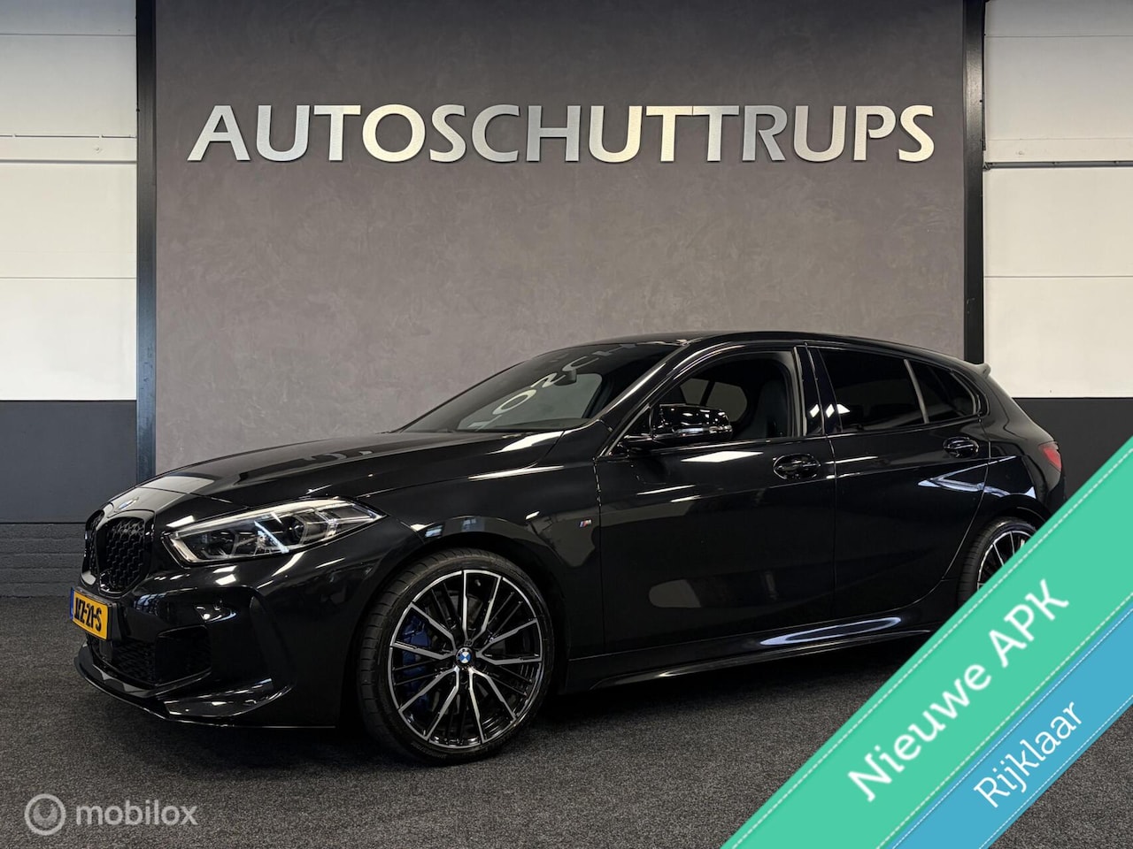 BMW 1-serie - M135i xDrive High Executive Edition M SPORT / SCHUIFDAK / VOL LEDER / PANO / HARMAN & KARD - AutoWereld.nl