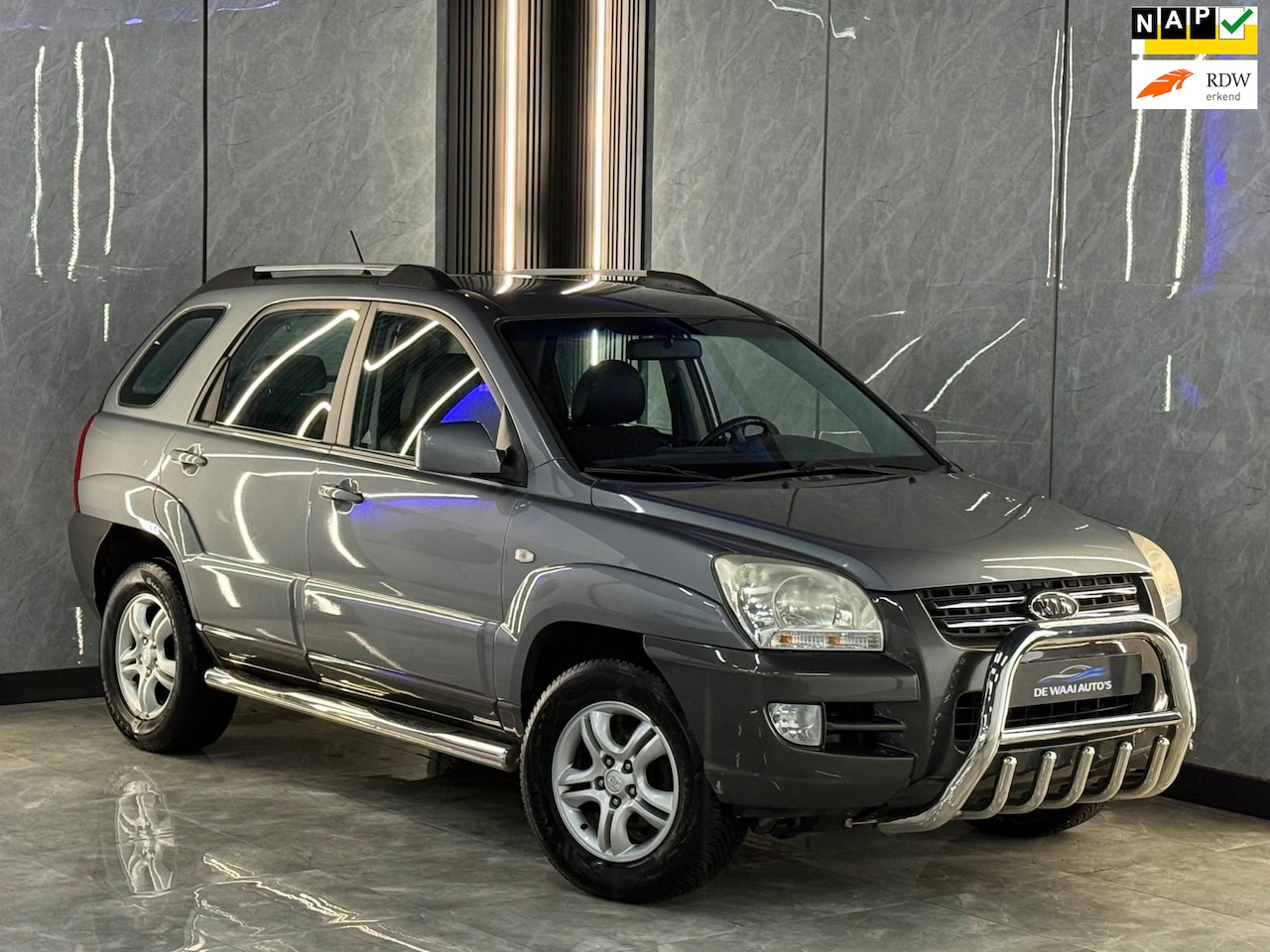 Kia Sportage - 2.0 CVVT Executive | dealer onderh | Half Leer | Cruise | Clima | NAP | Boekjes - AutoWereld.nl