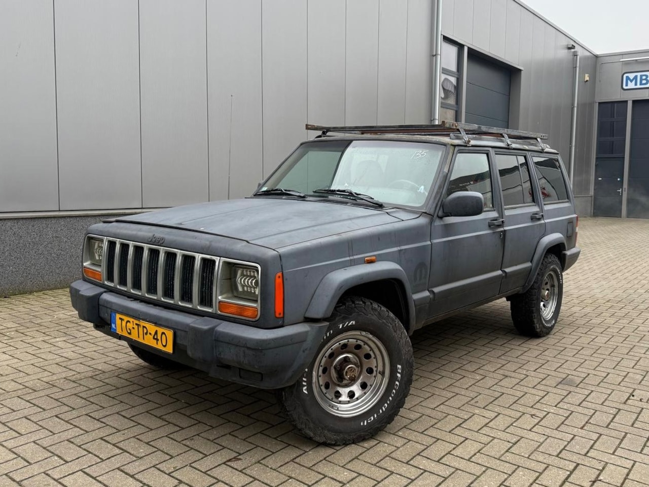 Jeep Cherokee - 4.0i Limited 4x4 - AutoWereld.nl
