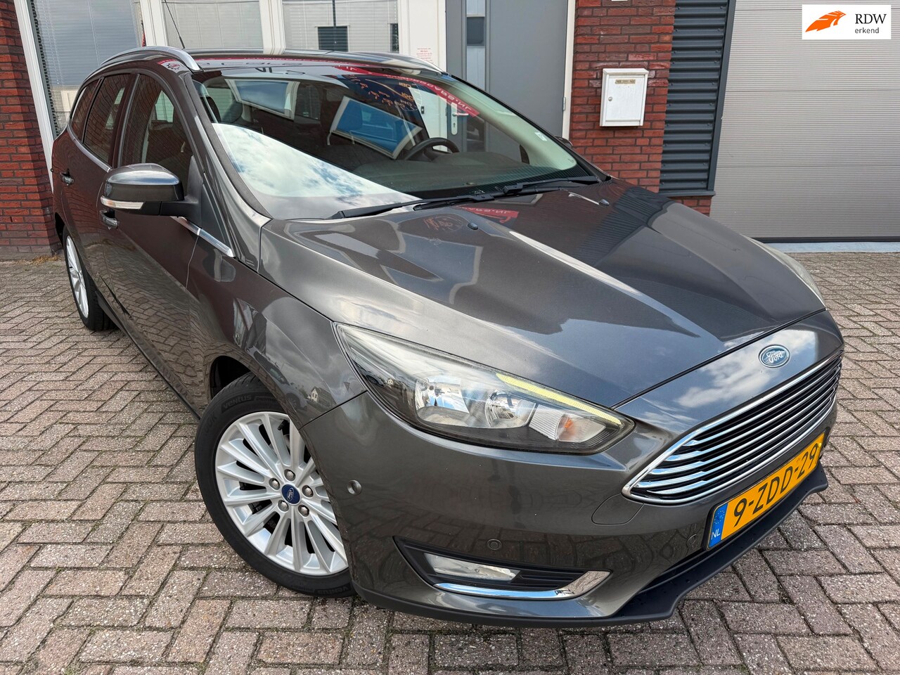 Ford Focus Wagon - 1.0 First Edition / 1e Eig / Navi / PDC / Park Assist / Clima / Cruise / NAP - AutoWereld.nl