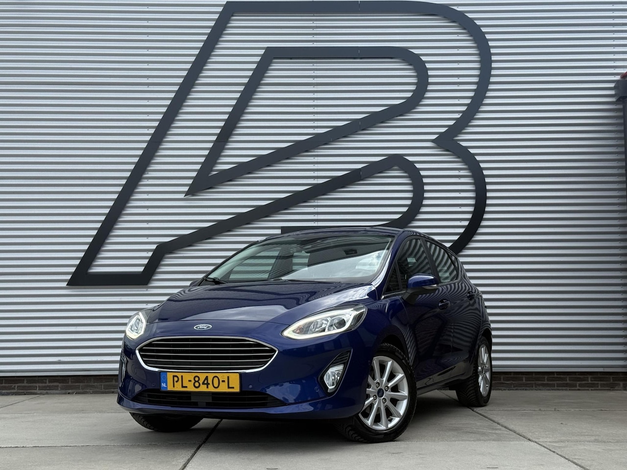 Ford Fiesta - 1.0 EcoBoost Titanium Navi|Camera|Clima|Cruise|B&O Sound System|Carplay|N.A.P|Nieuwe APK b - AutoWereld.nl