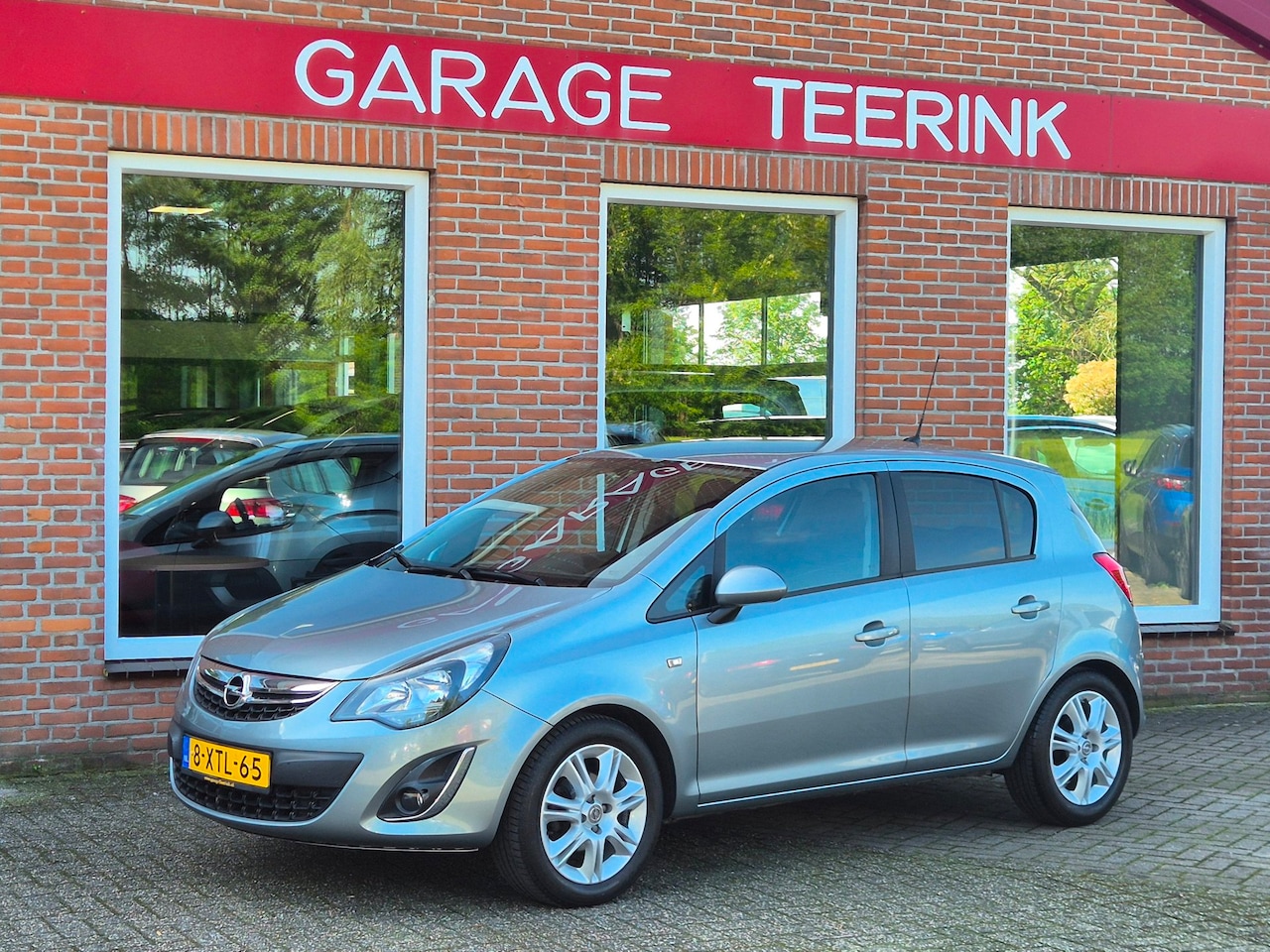 Opel Corsa - 1.4-16V BlitZ 101PK 5drs clima, cruise, pdc, navi, bluetooth, lmv, elektr.ramen - AutoWereld.nl
