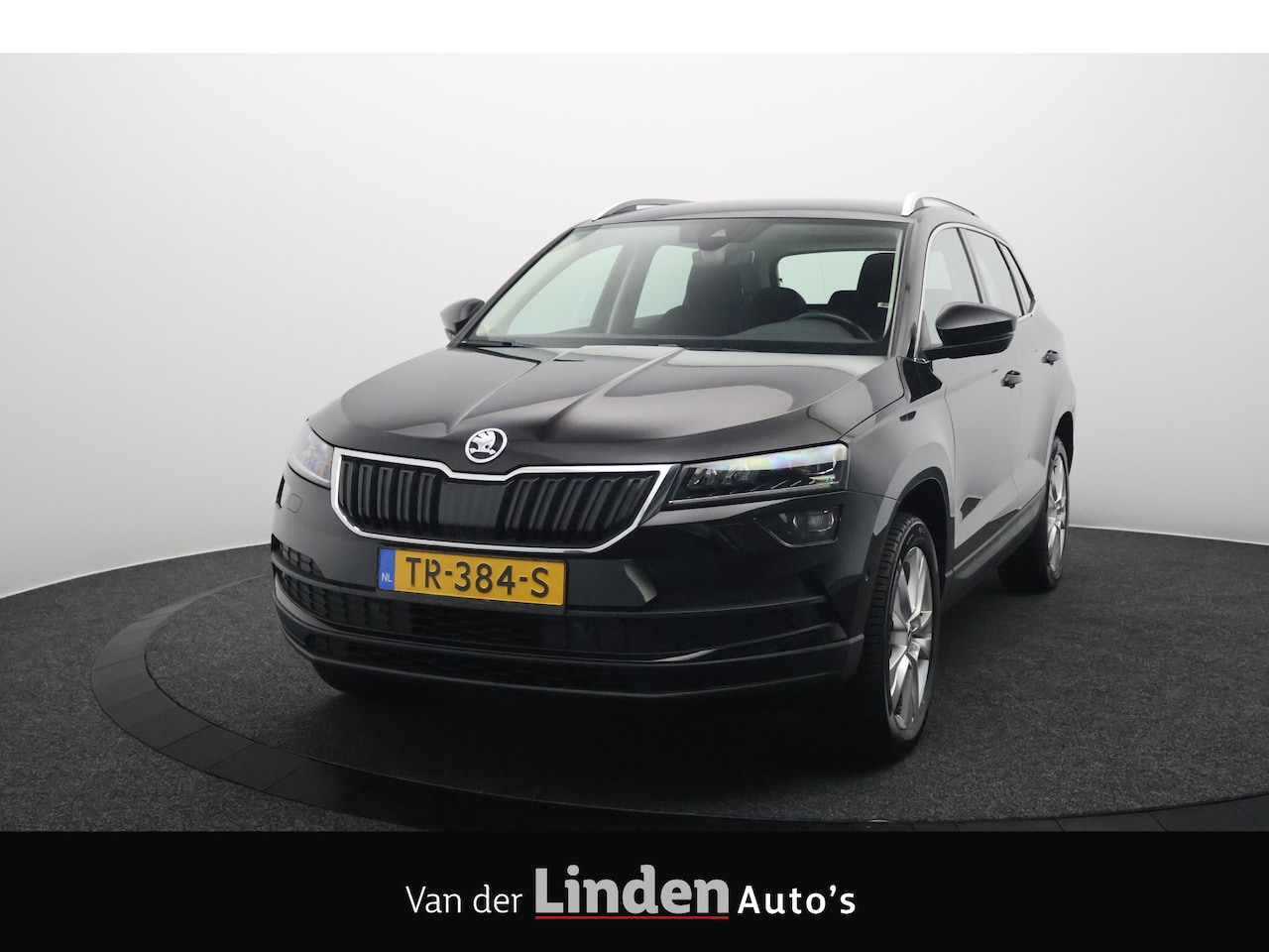 Skoda Karoq - 1.6 TDI Style Business | Led | Sfeerverlichting | Camera | Navigatie | Carplay&Android - AutoWereld.nl
