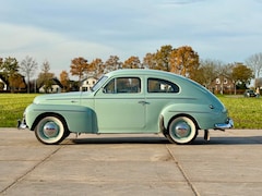 Volvo PV444 - Charmante pistache klassieker met whitewalls