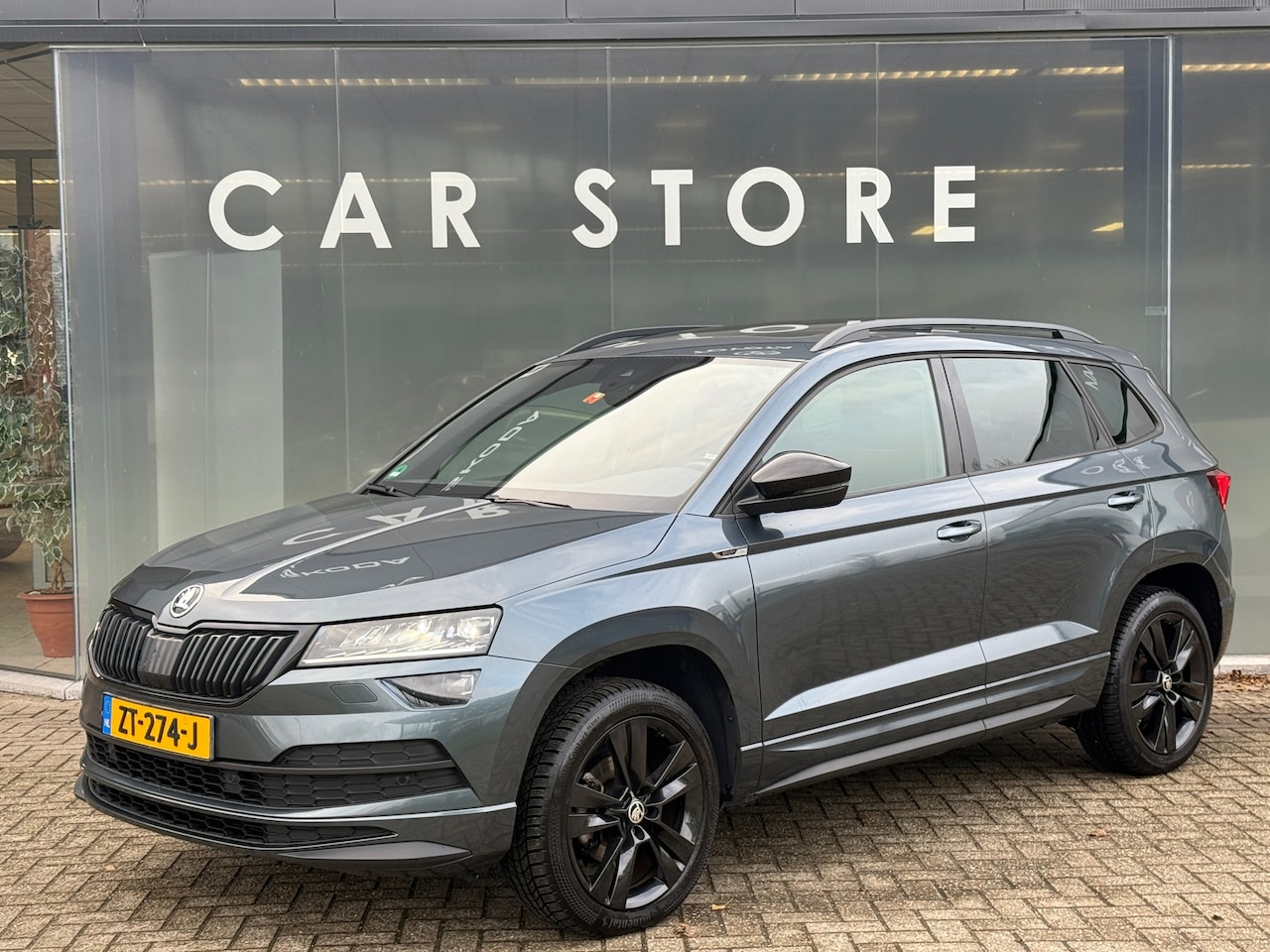 Skoda Karoq - 1.5 TSI DSG Sportline Pano|Sfeer|Canton|Dealer Onderhouden - AutoWereld.nl