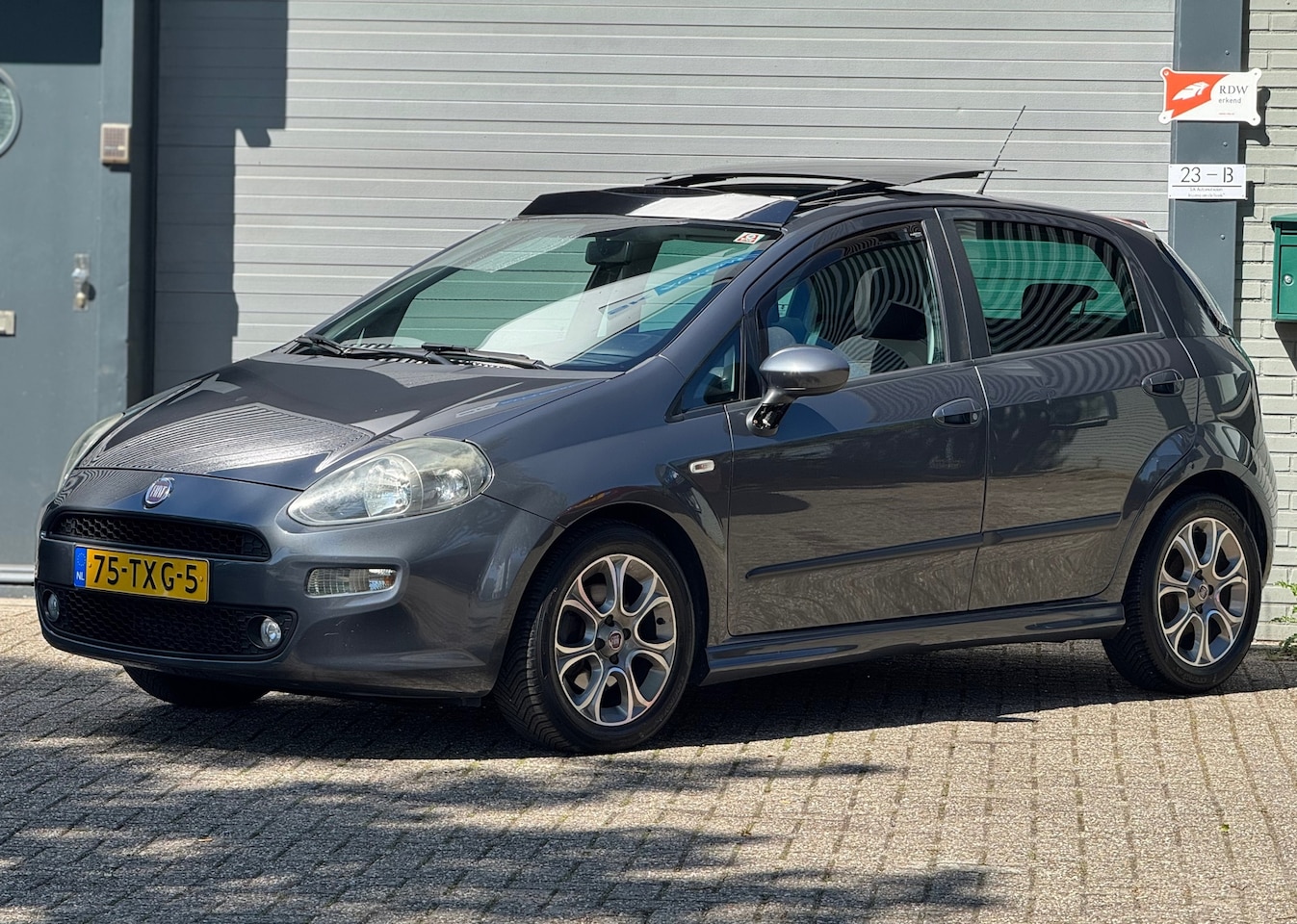 Fiat Punto Evo - 1.3 M-Jet Lounge 1.3 M-Jet Lounge - AutoWereld.nl