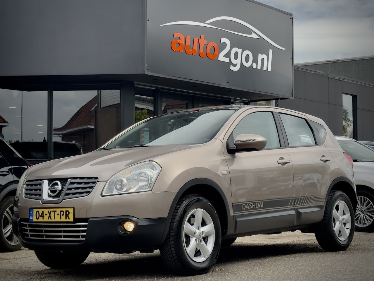 Nissan Qashqai - 1.6 ACENTA PANODAK NAVI CAMERA AIRCO LED LMV - AutoWereld.nl