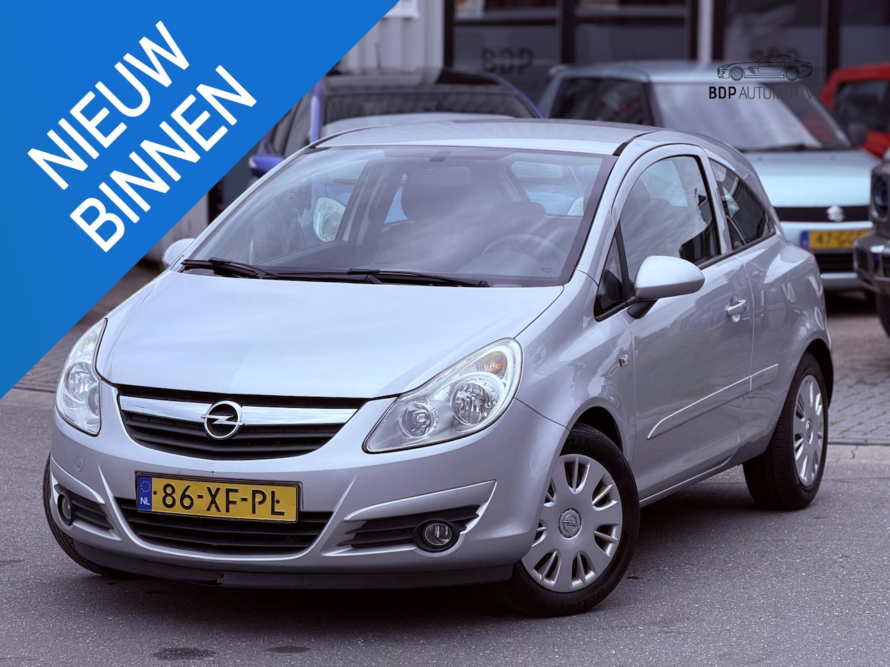 Opel Corsa - 1.4-16V Enjoy 1.4-16V Enjoy - AutoWereld.nl