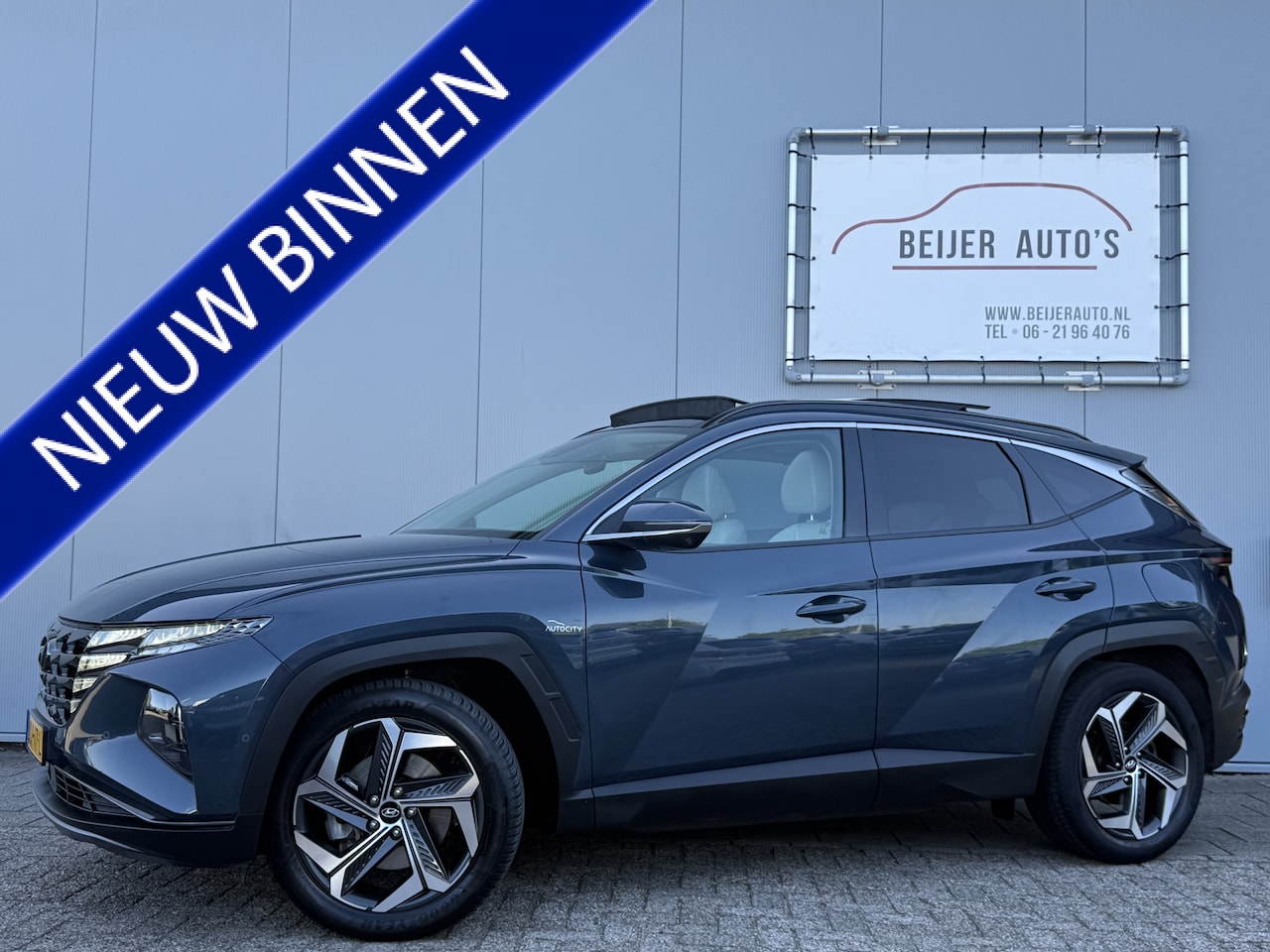 Hyundai Tucson - 1.6 T-GDI PHEV Premium 4WD Automaat Schuifdak/Camera. - AutoWereld.nl