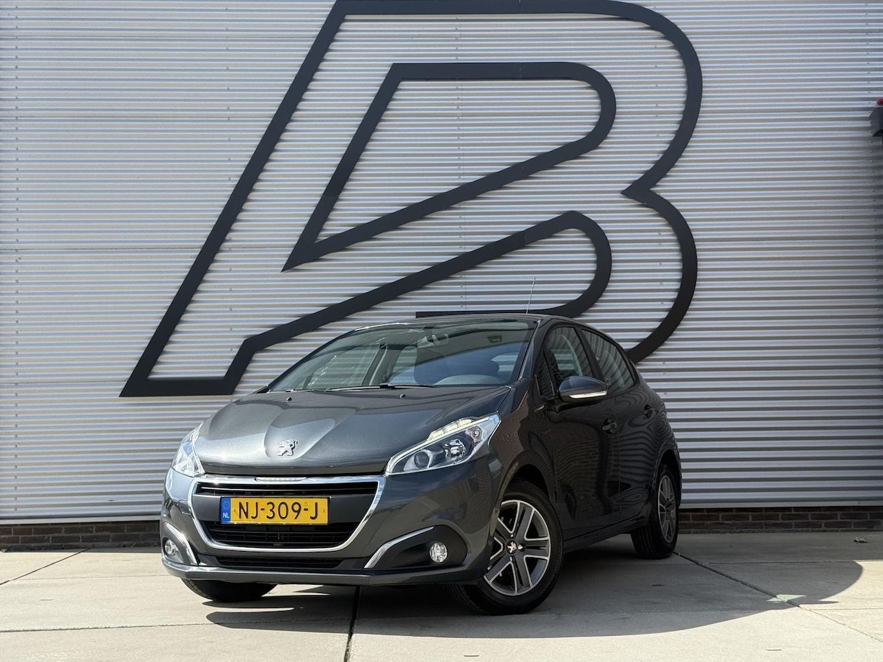 Peugeot 208 - 1.2 PureTech Blue Lion 1e Eigenaar|Navi|Airco|Cruise|Carplay|LM Velgen|N.A.P|APK tot 02-20 - AutoWereld.nl