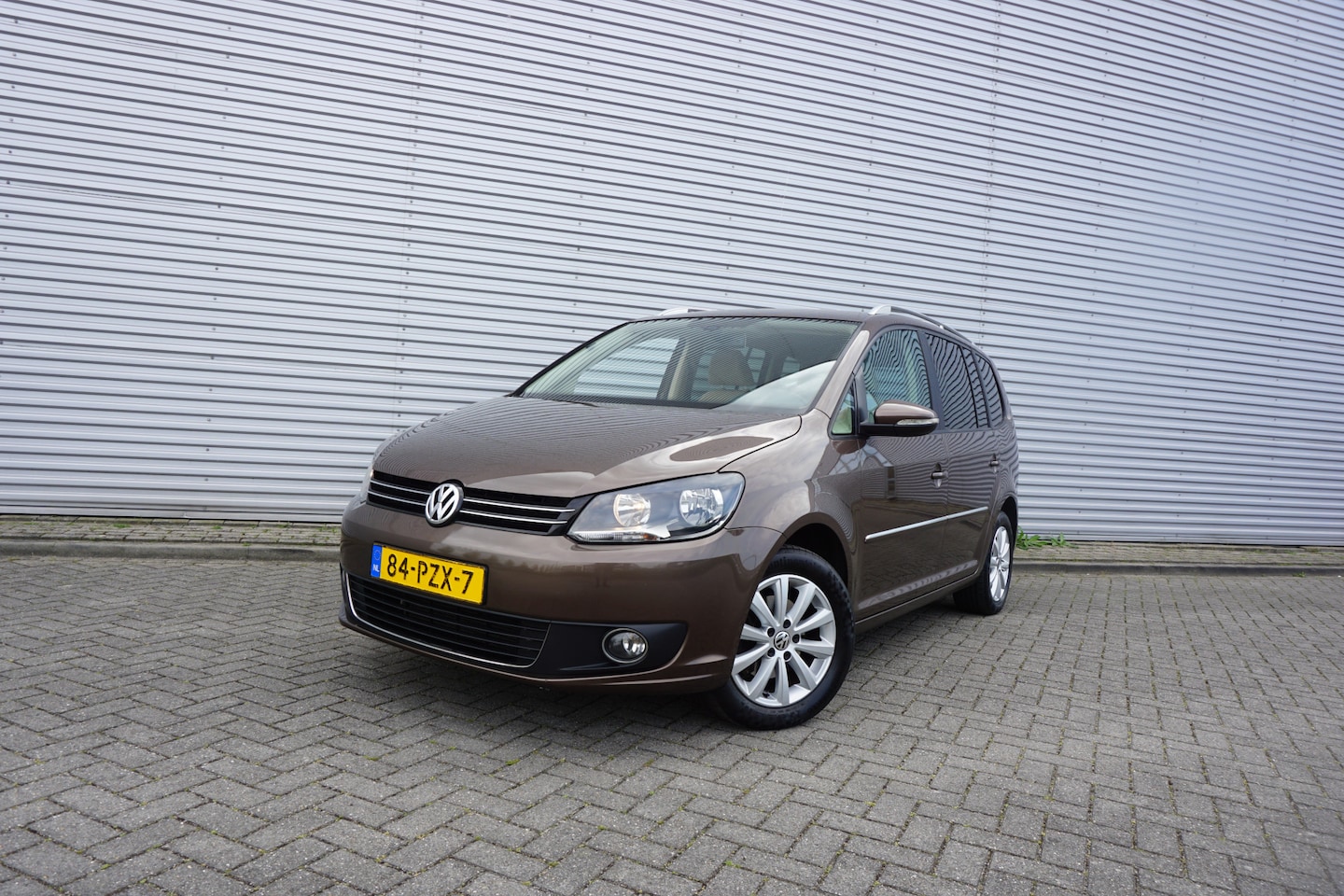 Volkswagen Touran - 1.2 TSI Highline BlueMotion Airco / Navi / Cruise / Elektr. ramen / Trekhaak / Lm velgen / - AutoWereld.nl