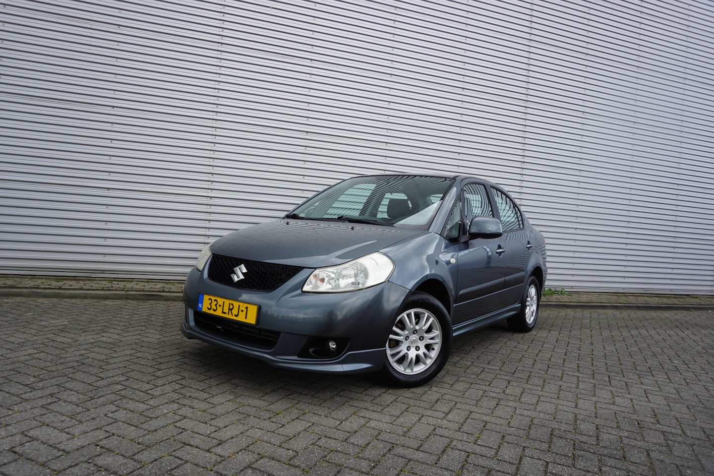 Suzuki SX4 - 1.6 Exclusive Airco / Elektr. ramen / Parkeersens. / Trekhaak / Lm velgen / NAP - AutoWereld.nl