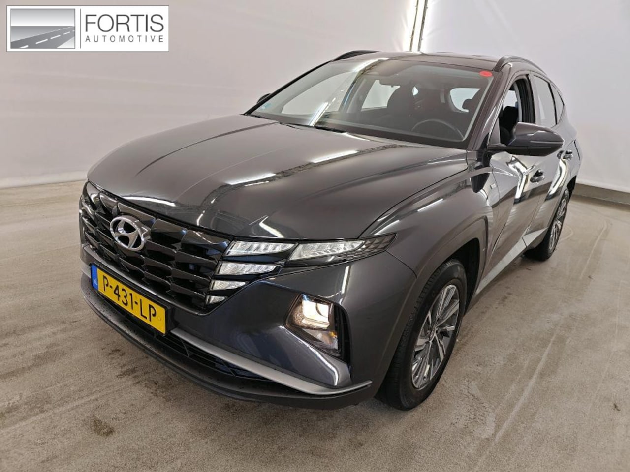 Hyundai Tucson - 1.6 T-GDI MHEV i-Motion NL-AUTO | TREKHAK | NAVI - AutoWereld.nl